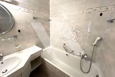 A vendre - Appartement de 2 pièces au coeur du village, avec échappée sur le lac